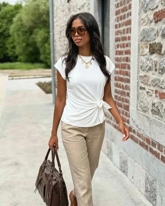 Biała bluzka damska z wiązaniem w talii - letni top